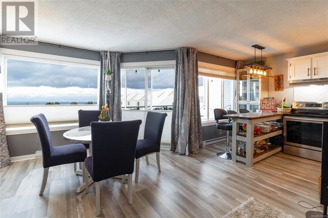 204b - 6231 Blueback Rd, Condo with 2 bedrooms, 1 bathrooms and 2 parking in Nanaimo BC | Image 28