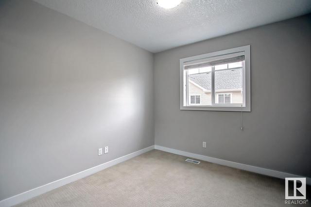38 - 675 Albany Wy Nw, House attached with 3 bedrooms, 2 bathrooms and 2 parking in Edmonton AB | Image 36