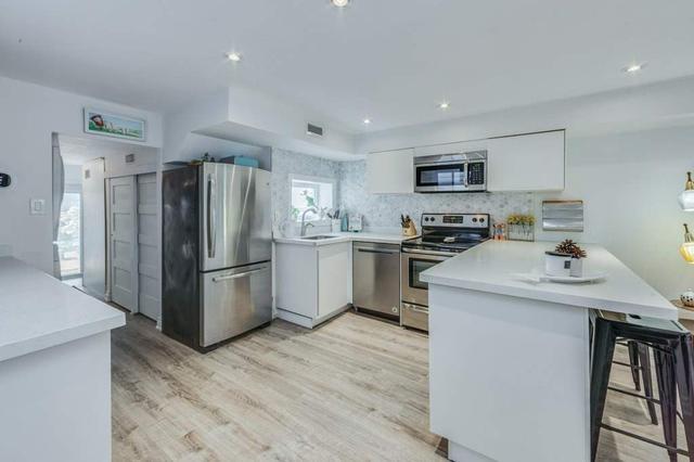 116 Rhodes Ave, House attached with 2 bedrooms, 1 bathrooms and 1 parking in Toronto ON | Image 2