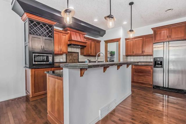 23 Tuscany Estates Drive Nw, House detached with 4 bedrooms, 3 bathrooms and 6 parking in Calgary AB | Image 4
