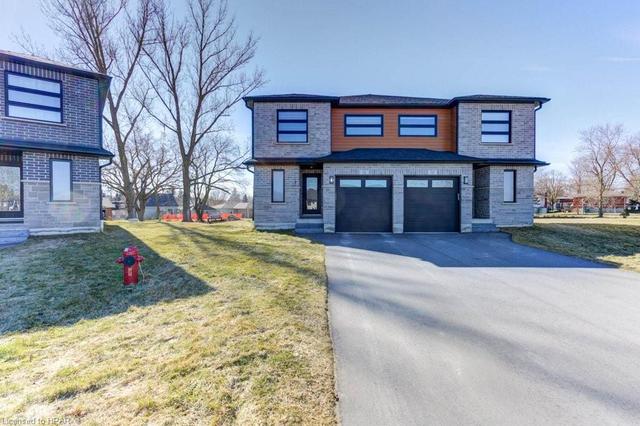 131 Jefferey Way, House semidetached with 3 bedrooms, 2 bathrooms and 5 parking in Wellington North ON | Image 1