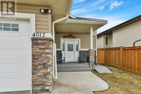 4012 68 Street, House semidetached with 4 bedrooms, 3 bathrooms and 2 parking in Stettler AB | Card Image