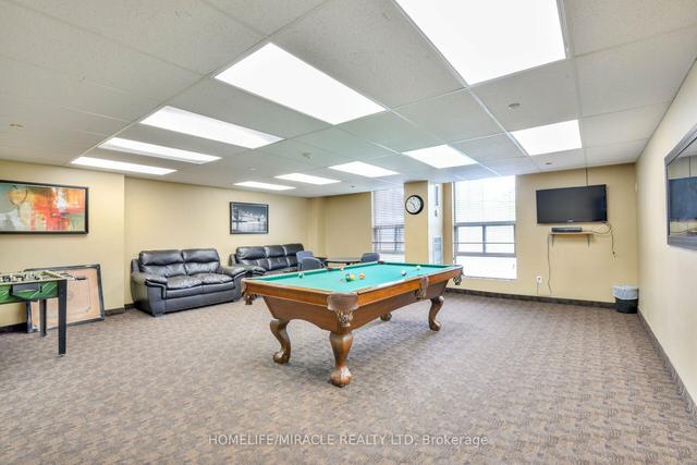 410 - 25 Kensington Rd, Condo with 2 bedrooms, 1 bathrooms and 1 parking in Brampton ON | Image 21