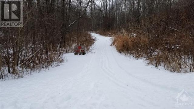 Winter photo of trail into land from Ronson Rd | Image 3