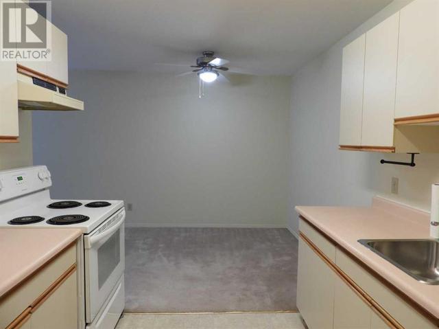 304, - 5414 53 Street, Condo with 2 bedrooms, 1 bathrooms and 1 parking in Lacombe AB | Image 3