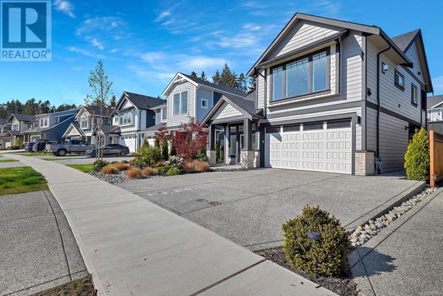 221 Caspian Dr, House detached with 4 bedrooms, 3 bathrooms and 3 parking in Colwood BC | Image 2