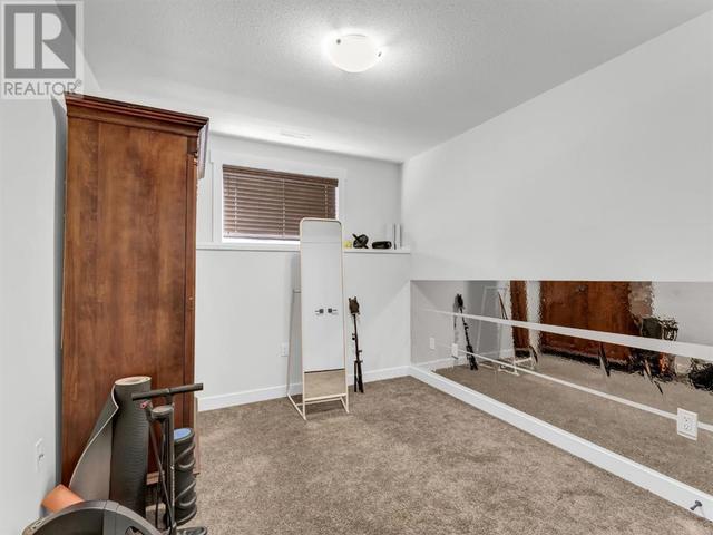 910 9 Avenue Se, Home with 3 bedrooms, 2 bathrooms and 4 parking in Redcliff AB | Image 37