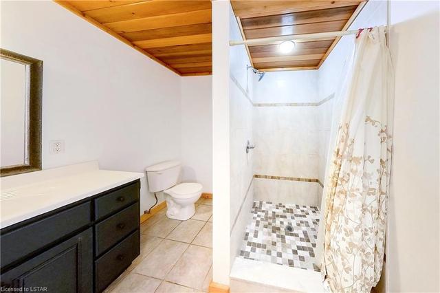Lower level FULL bathroom with stellar tile shower and stained cedar ceiling - your 3rd FULL bath! | Image 33