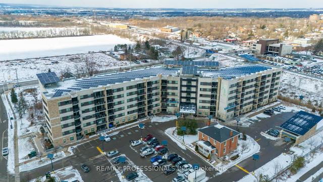 209 - 33 Whitmer St, Condo with 2 bedrooms, 2 bathrooms and 1 parking in Milton ON | Image 1
