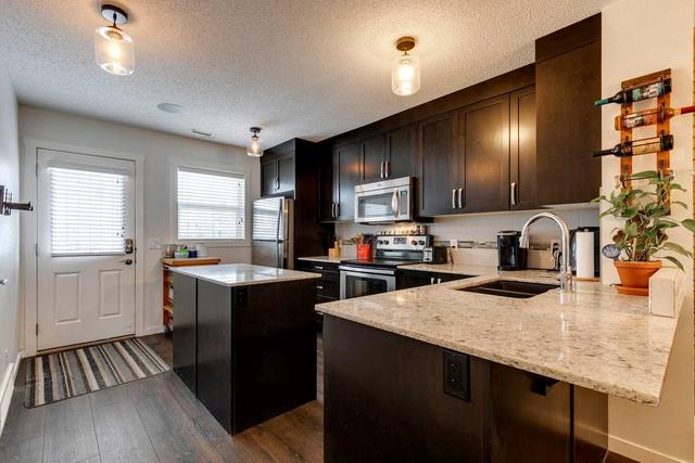 80 Auburn Bay Link Se, Home with 2 bedrooms, 1 bathrooms and 1 parking in Calgary AB | Image 8