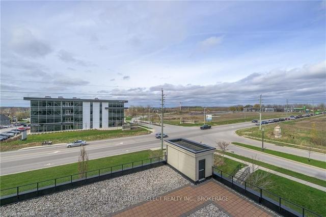 404 - 240 Villagewalk Blvd, Condo with 3 bedrooms, 2 bathrooms and 1 parking in London ON | Image 11