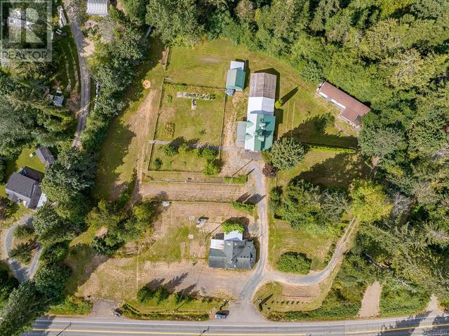 8185 Island Hwy S, House detached with 4 bedrooms, 4 bathrooms and 6 parking in Comox Valley A BC | Image 37