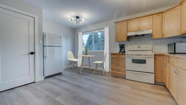 215 Tache Avenue Nw, House detached with 5 bedrooms, 2 bathrooms and 4 parking in Calgary AB | Image 13
