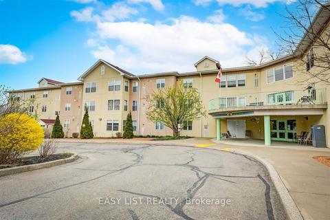 311 - 8 Huron St, Condo with 2 bedrooms, 2 bathrooms and 1 parking in Kawartha Lakes ON | Card Image