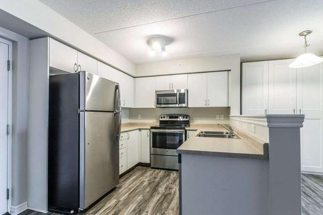 111 - 1470 Main St E, Condo with 2 bedrooms, 2 bathrooms and 1 parking in Milton ON | Image 35