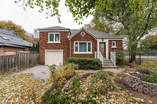 205 Prince Edward Dr S, House detached with 3 bedrooms, 2 bathrooms and 3 parking in Toronto ON | Image 1
