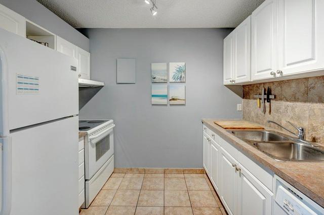 1203 - 4944 Dalton Drive Nw, Condo with 2 bedrooms, 1 bathrooms and 1 parking in Calgary AB | Image 8
