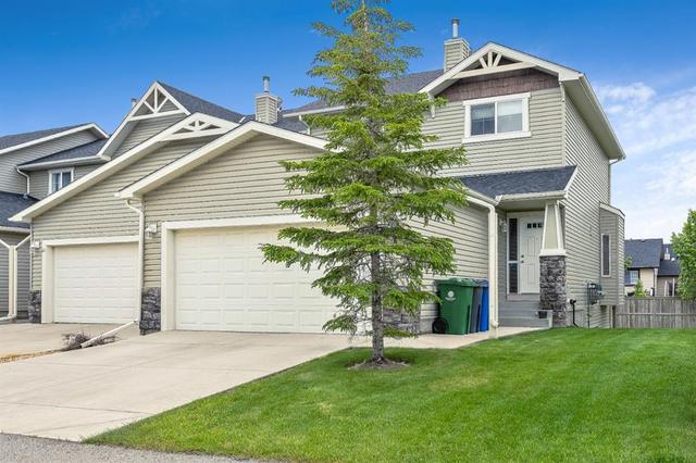 51 Arbours Circle Nw, House attached with 3 bedrooms, 2 bathrooms and 4 parking in Rocky View County AB | Card Image