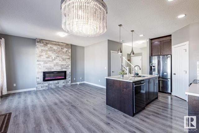 2444 17 Av Nw, House semidetached with 4 bedrooms, 3 bathrooms and null parking in Edmonton AB | Image 1