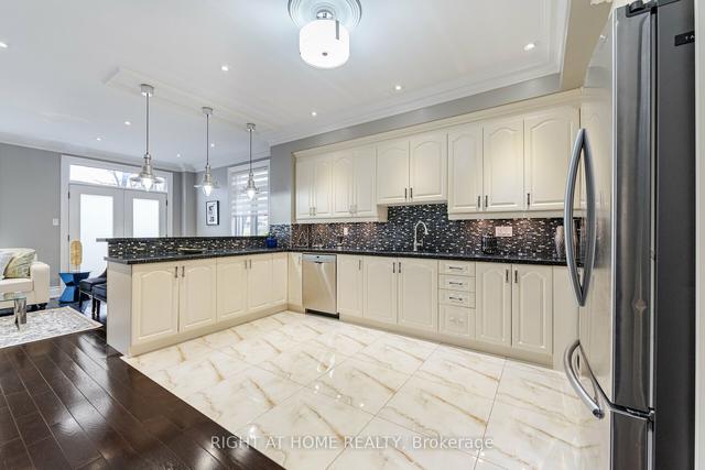 39a Wolcott Ave, House detached with 4 bedrooms, 5 bathrooms and 2 parking in Toronto ON | Image 3