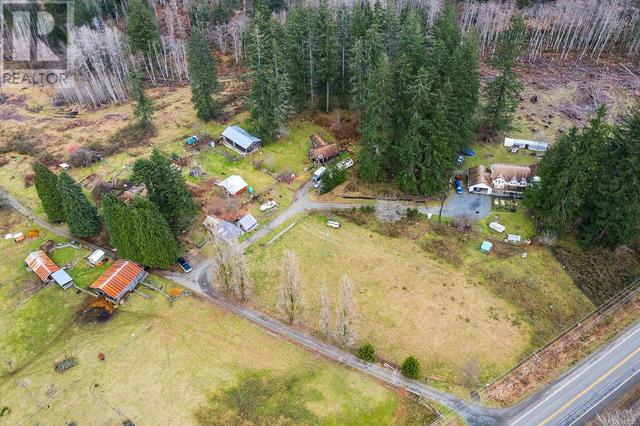 7522 Island Hwy N, House detached with 4 bedrooms, 3 bathrooms and 10 parking in Comox Valley C (Puntledge   Black Creek) BC | Image 12
