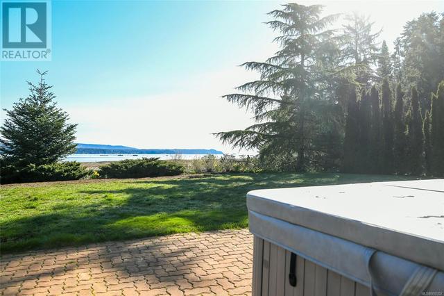 501 Arbutus Bay Rd, House detached with 3 bedrooms, 3 bathrooms and 10 parking in Comox Valley A BC | Image 38