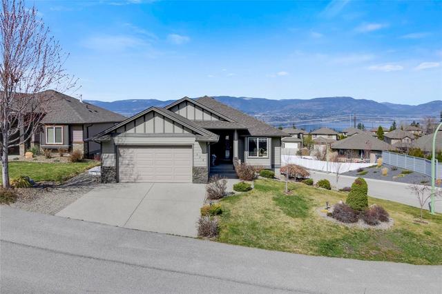 529 Tungsten Court, House detached with 5 bedrooms, 3 bathrooms and null parking in Kelowna BC | Card Image