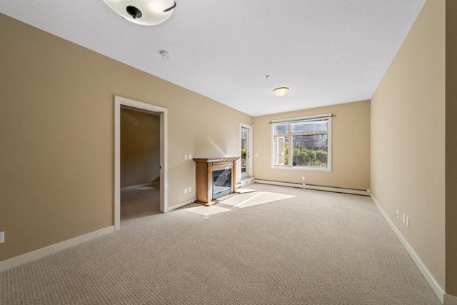 211 - 35 Aspenmont Heights Sw, Condo with 2 bedrooms, 2 bathrooms and 1 parking in Calgary AB | Image 11