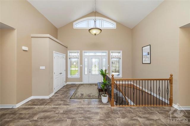Step inside this welcoming foyer. | Image 4