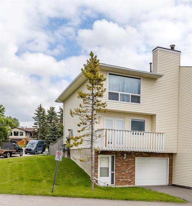 1 - 24 Cascade Place, House attached with 3 bedrooms, 2 bathrooms and 2 parking in Cochrane AB | Card Image