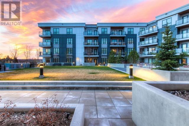 303, - 383 Smith Street Nw, Condo with 1 bedrooms, 2 bathrooms and 1 parking in Calgary AB | Image 22