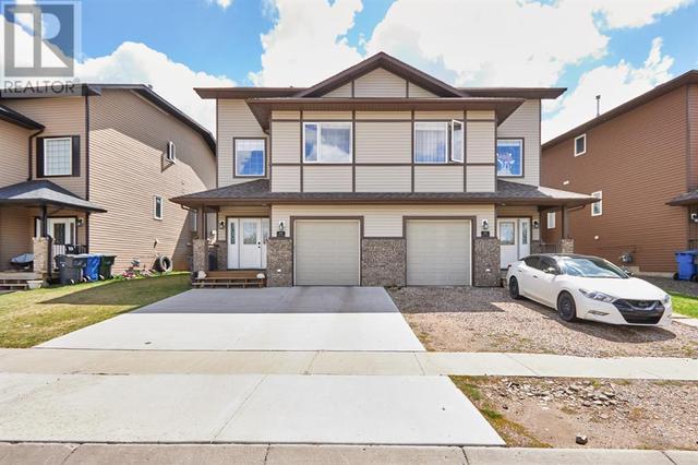 85 Hamptons Way Se, House semidetached with 3 bedrooms, 2 bathrooms and 2 parking in Medicine Hat AB | Card Image