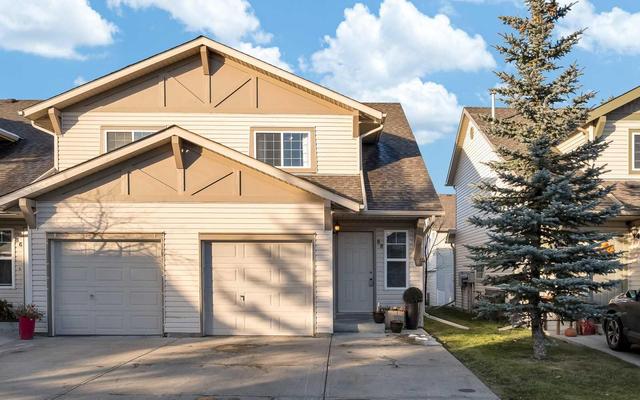 88 Eversyde Court Sw, Home with 3 bedrooms, 1 bathrooms and 3 parking in Calgary AB | Image 1