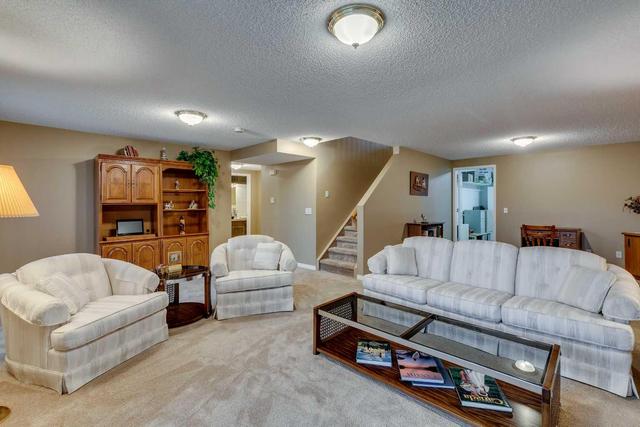 133 Sienna Park Green Sw, Home with 3 bedrooms, 2 bathrooms and 4 parking in Calgary AB | Image 25