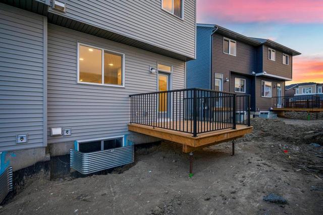 17 Herron Mews Ne, Home with 3 bedrooms, 2 bathrooms and 2 parking in Calgary AB | Image 5