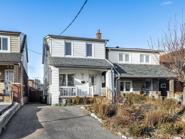 30 Bushey Ave, House detached with 3 bedrooms, 2 bathrooms and 2 parking in Toronto ON | Image 1