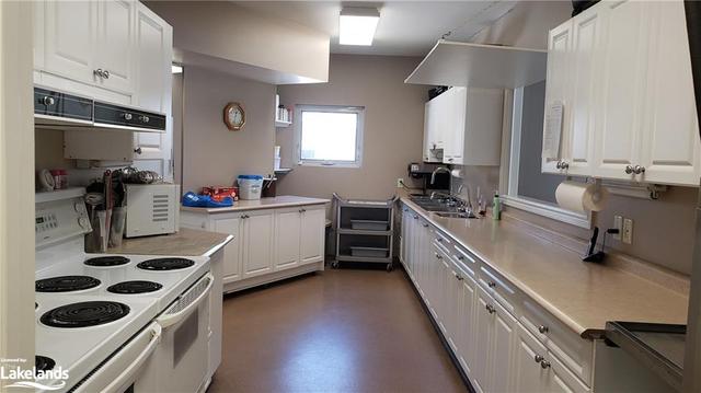 Large bright kitchen in Clubhouse for your Family events | Image 3