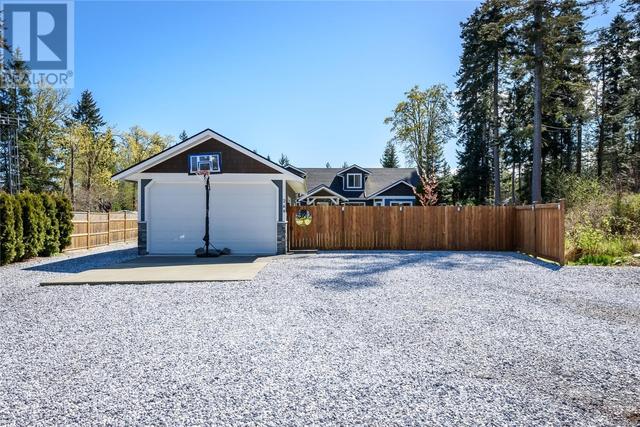 269 Spindrift Rd, House detached with 4 bedrooms, 3 bathrooms and 6 parking in Comox Valley A BC | Image 3