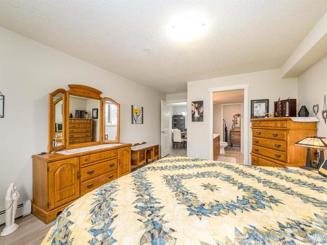 124 - 7229 Sierra Morena Boulevard Sw, Condo with 2 bedrooms, 2 bathrooms and 1 parking in Calgary AB | Image 10