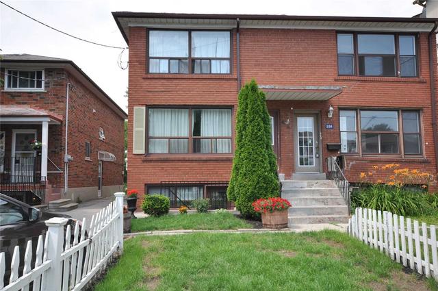 224 Pickering St, House semidetached with 6 bedrooms, 4 bathrooms and 4 parking in Toronto ON | Image 1
