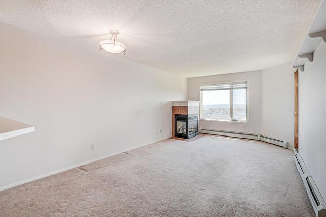 1304 - 950 Arbour Lake Road Nw, Condo with 2 bedrooms, 2 bathrooms and 1 parking in Calgary AB | Image 12