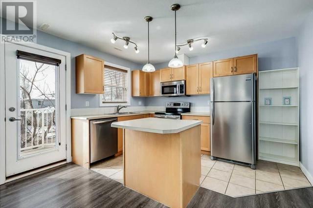 208, - 50 Westland Road, House attached with 3 bedrooms, 2 bathrooms and 2 parking in Okotoks AB | Image 4