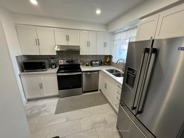 29 Puma Dr, House semidetached with 3 bedrooms, 2 bathrooms and 2 parking in Toronto ON | Image 2
