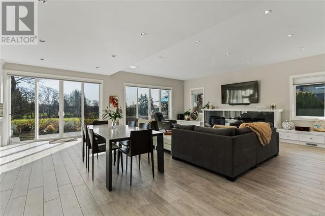 Dining/ living area - radiant heated floor on entire main level | Image 9