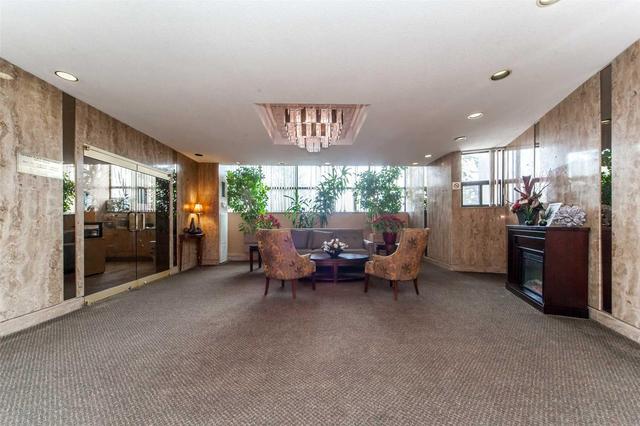709 - 11 Wincott Dr, Condo with 3 bedrooms, 1 bathrooms and 2 parking in Toronto ON | Image 2
