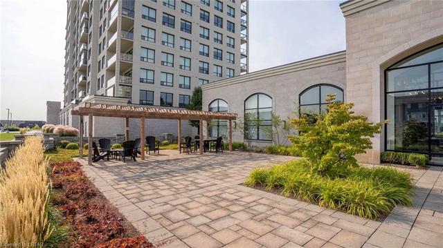 1013 - 240 Villagewalk Boulevard, House attached with 2 bedrooms, 1 bathrooms and 2 parking in London ON | Image 33