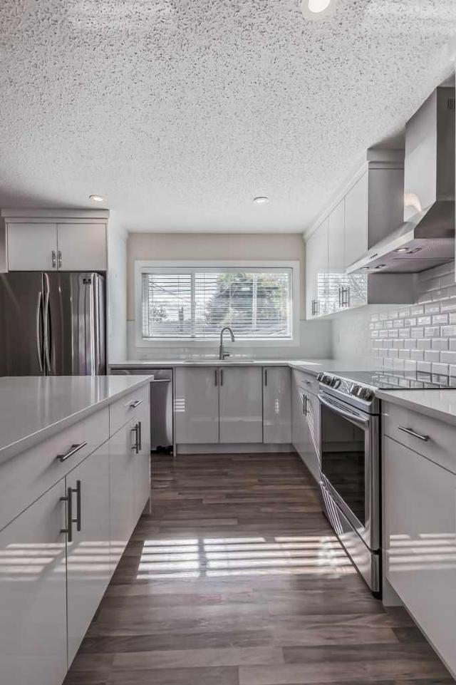 619 84 Avenue Sw, House detached with 4 bedrooms, 3 bathrooms and 4 parking in Calgary AB | Image 12