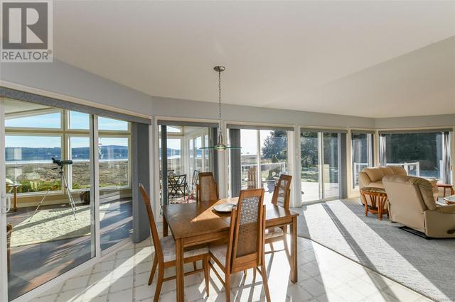 501 Arbutus Bay Rd, House detached with 3 bedrooms, 3 bathrooms and 10 parking in Comox Valley A BC | Image 6