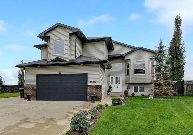 10212 93 Avenue, House detached with 5 bedrooms, 3 bathrooms and 6 parking in Sexsmith AB | Image 3