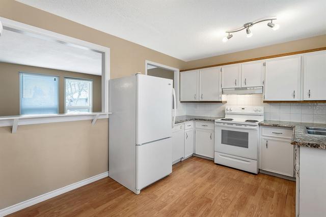 120 Whitehill Place Ne, Home with 3 bedrooms, 2 bathrooms and 2 parking in Calgary AB | Image 2